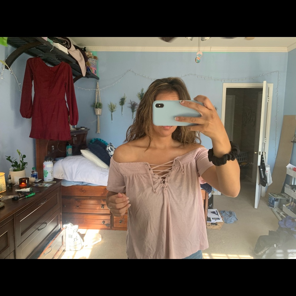 Over the shoulder pink blouse